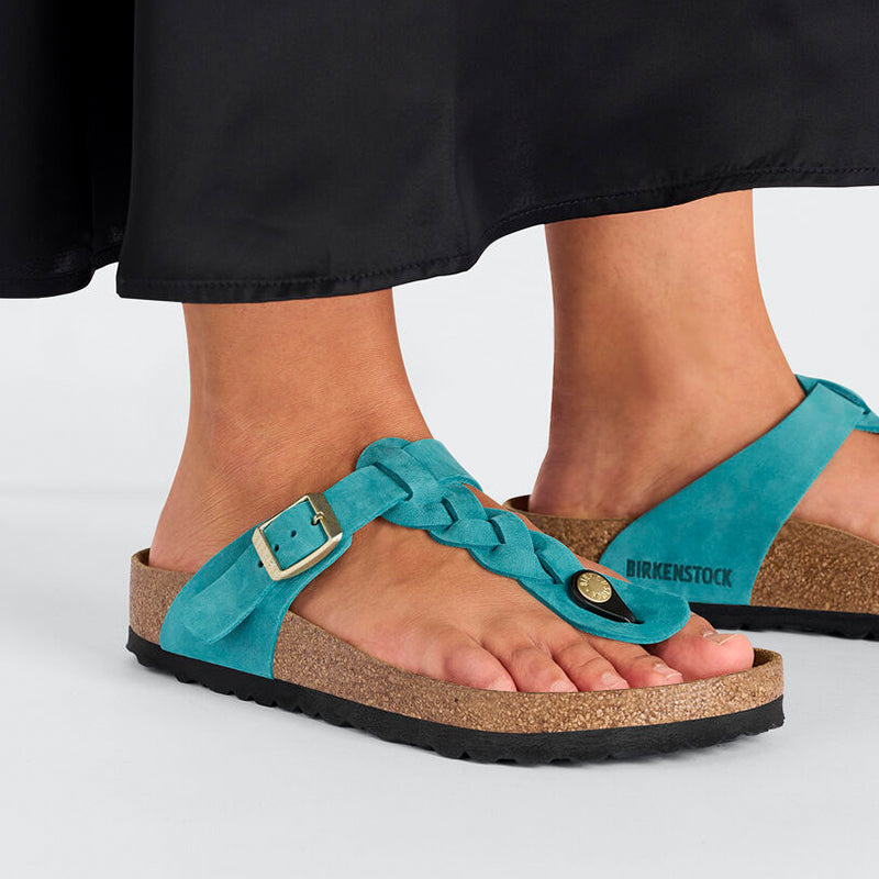 Women's Birkenstock Gizeh Braid - Biscay Oiled Leather - Lifestyle Image of Woman Wearing Birkenstock Gizeh Braid Sandals - Available at Tradehome Shoes