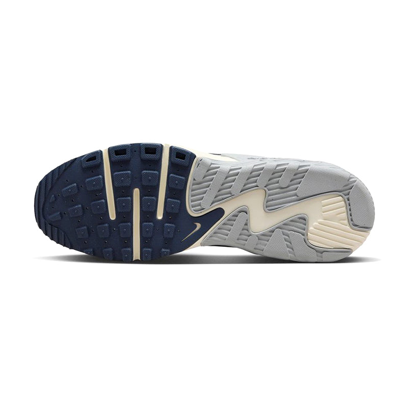 Bottom view of Nike Men's Air Max Excee Sneaker in Sail/ Navy/ Iron.