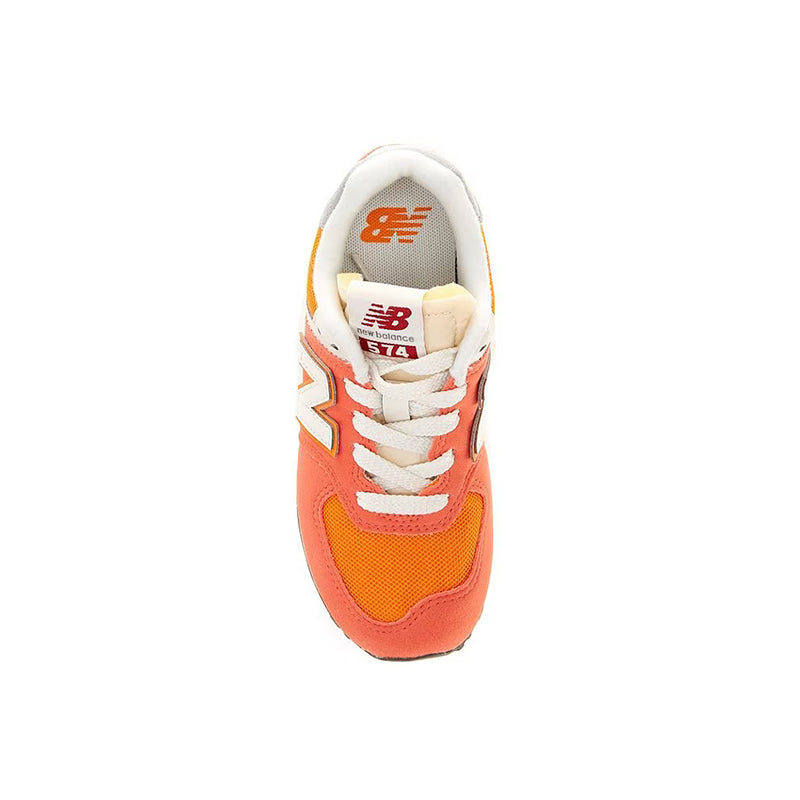 View of Kid's New Balance Grade School 574 sneaker in gulf red/white from above.