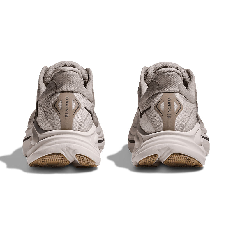 Pair of gray running shoes with brand logo on a white background