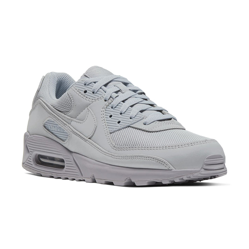 Angled side view of Nike Men's Air Max 90 sneaker in grey/grey/black.