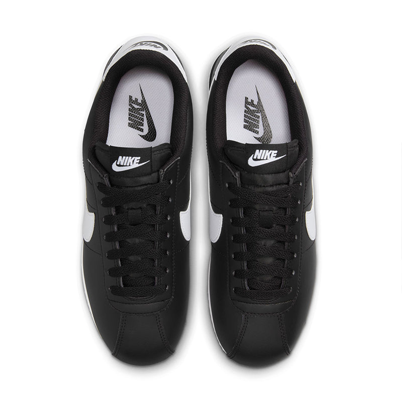 View of Nike Women's Cortez sneaker in black/white from above.