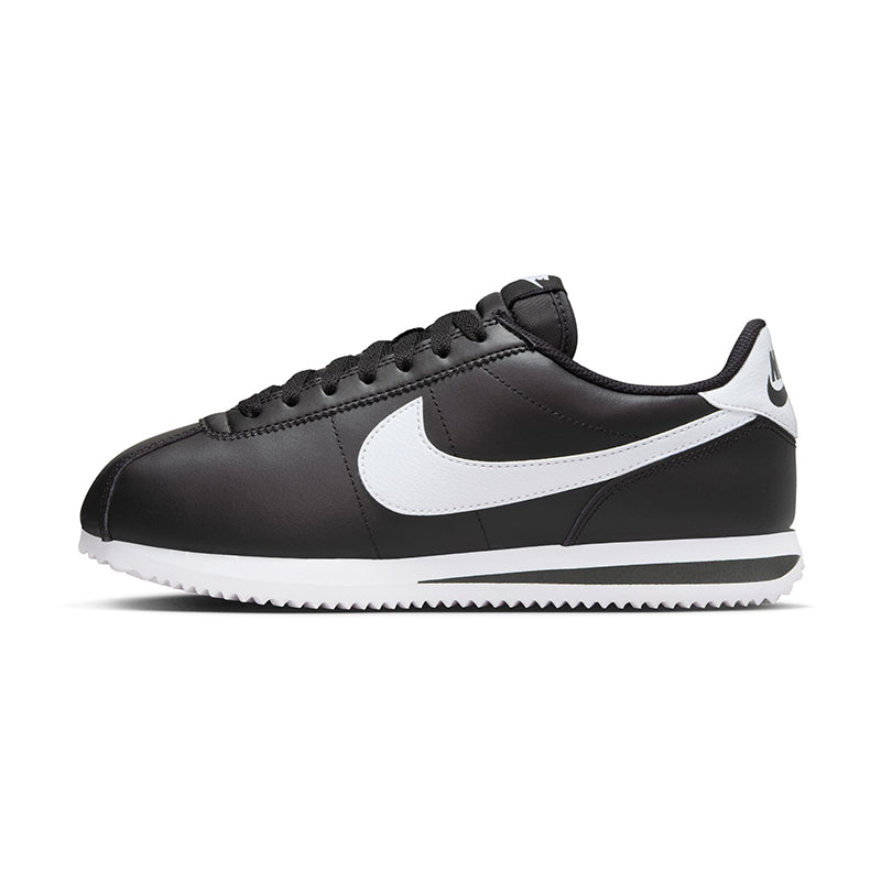 Side view of Nike Women's Cortez sneaker in black/white.