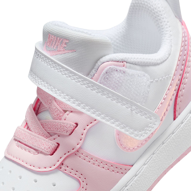 Zoomed in strap view of Nike Kid's Toddler Court Borough Low Recraft sneaker in white/foam pink.