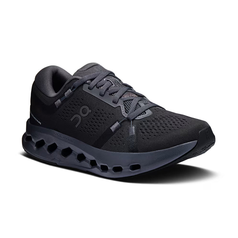 Black and gray running shoe on a white background