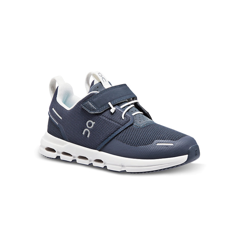 A kid's preschool sneaker with a midnight blue upper and white accents, featuring a lace-up closure system.