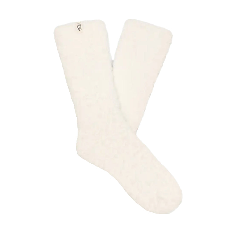 A pair of women's cozy crew socks in a cream color, with a visible brand logo on the top cuff.