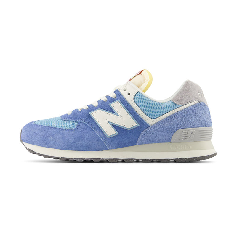 Side view of New Balance Women's 574 Sneaker in Alpine Blue/ White.