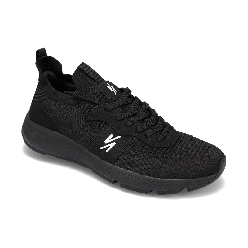 Angled side view of Rival Men's Reign sneaker in Black/ Black.