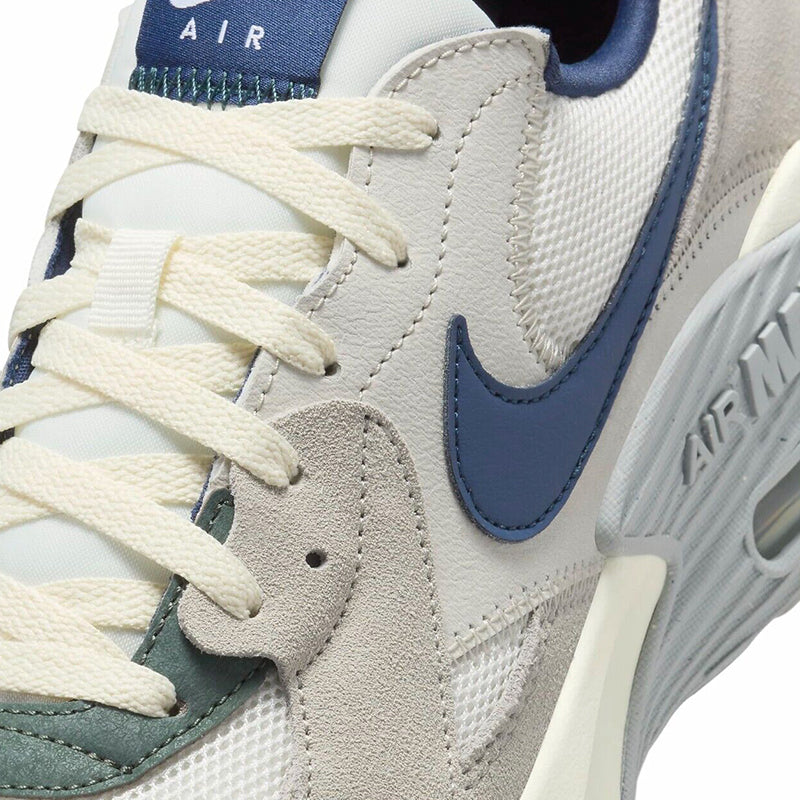 Zoomed in lace view of Nike Men's Air Max Excee Sneaker in Sail/ Navy/ Iron.