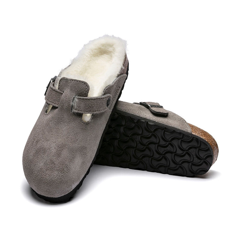 Women's Birkenstock Boston Shearling (NARROW) - Stone Coin Suede - Pair of Shoes Leaning Against Each Other - Available at Tradehome Shoes