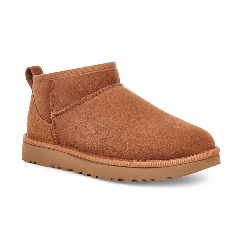 Angled side view of Women's UGG Classic Ultra Mini boot in chestnut.