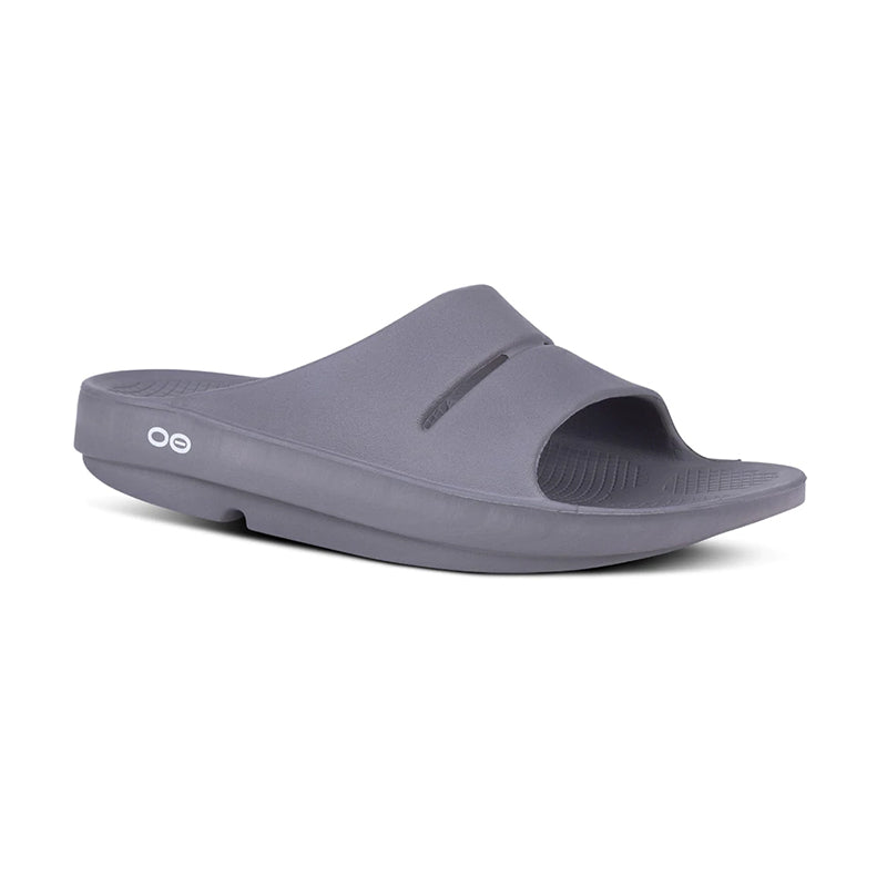 Angled side view of OOfos Men's Slide sandal in slate.