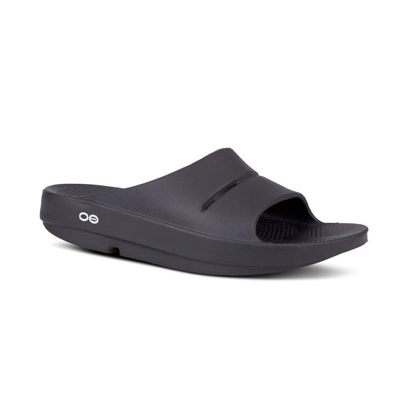 Angled side view of OOFOS Men's Ooahh Slide in Black.