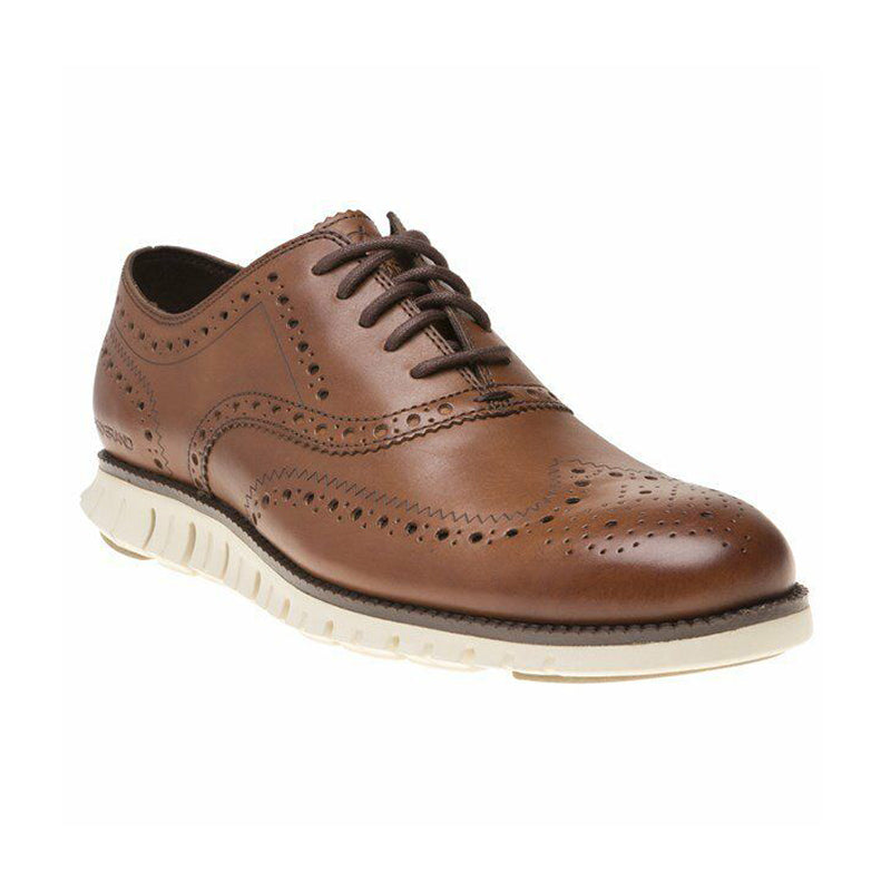 Men's Cole Haan ZEROGRAND Wingtip Oxford - British Tan - 45° Angle - Available at Tradehome Shoes
